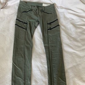 Army green jeans with zippers